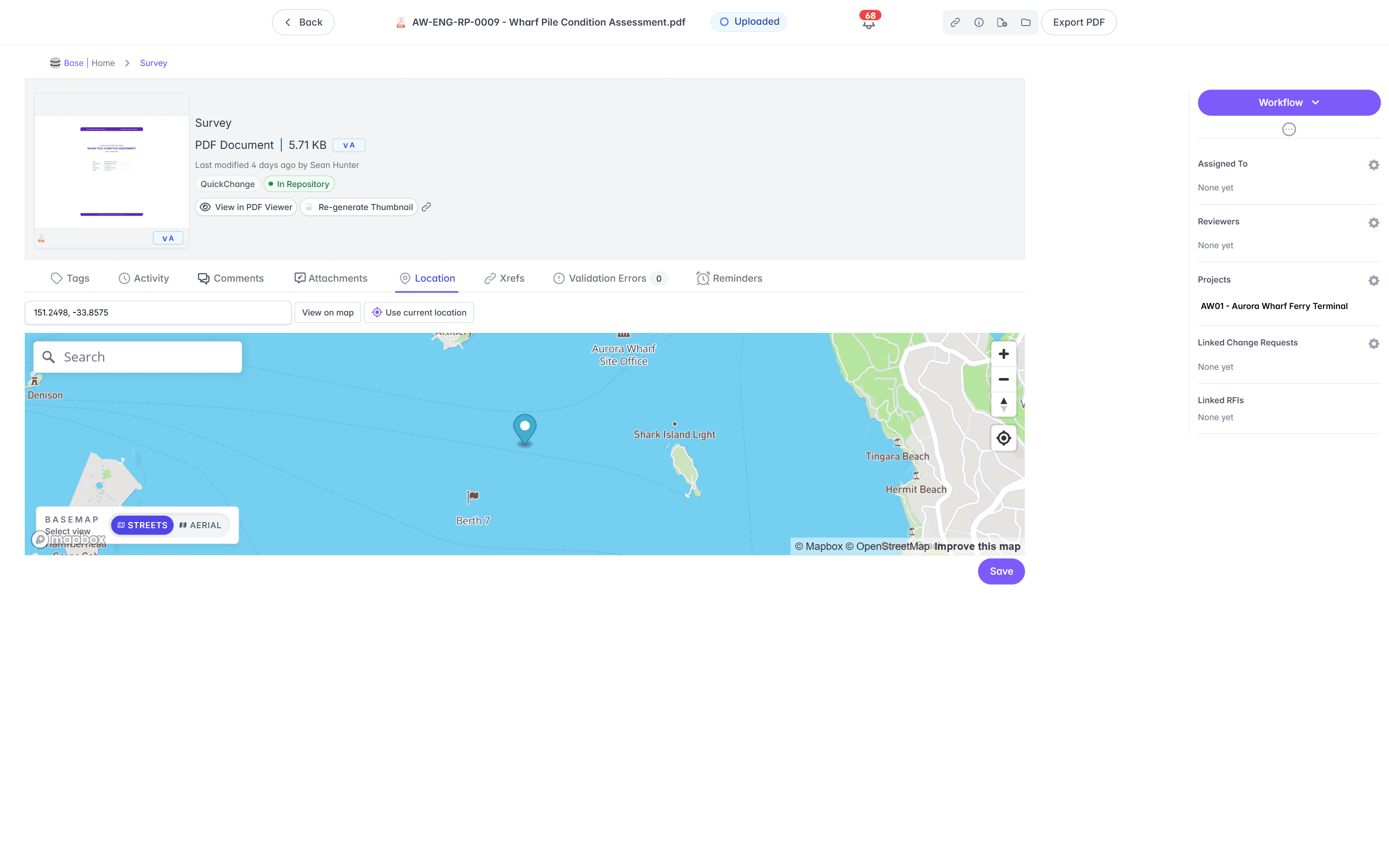 Location view with a coordinate field, a Sydney Harbour map showing the document's pin, a Streets and Aerial basemap toggle, and a Save button